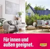 A split image showing a living room interior on the left and a house exterior with solar panels and a patio on the right, with text overlay at the bottom. Produktbild-Vorschau