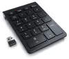 A black wireless numpad and its USB receiver are shown on a white background. Náhled obrázku produktu