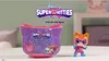 A SuperKitties collectible mini figure and its packaging are displayed on a table. Náhľad obrázku produktu