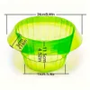 Limettengrüne durchsichtige Plastikschüssel mit ausgestelltem Rand, Maße: 24 cm oberer Durchmesser, 15 cm Bodendurchmesser, 11,5 cm Höhe und 3 cm Randhöhe Anteprima dell’immagine prodotto