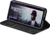 A smartphone in a black flip case is displayed, showing a movie streaming interface on its screen. Produktbild-Vorschau