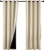 Two beige curtains hanging from a curtain rod, with one curtain pulled back to reveal a black lining. Produktbild-Vorschau