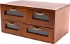 A wooden desk organizer with four drawers, each featuring a transparent window and a gold-colored handle. Podgląd zdjęcia produktu