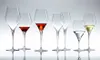 A collection of seven wine glasses of various shapes and sizes, some containing red wine, clear liquid, and white wine, arranged on a reflective surface against a gradient background. Náhľad obrázku produktu