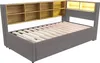 A grey upholstered bed frame with a wooden headboard featuring shelves and integrated LED lighting. Produktbild-Vorschau