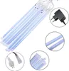 A set of LED meteor shower lights and their accessories. Produktbild-Vorschau