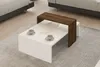 A modern living room setting with a white and walnut coffee table. Produktbild-Vorschau