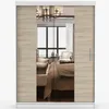 A sliding door wardrobe with mirrored panels in a bedroom setting. Voir les images du produit