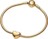 A gold Pandora bracelet with a heart charm and a clasp with the Pandora logo. Podgląd zdjęcia produktu