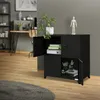 A black metal cabinet with four doors is shown in a home office setting. The cabinet is open, revealing files and office supplies inside. A plant sits on top of the cabinet, and a wooden floor and grey rug are visible. Náhled obrázku produktu