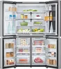 An open refrigerator with food items inside. Produktbild-Vorschau