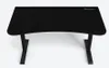 A black gaming desk with a curved front edge and two T-shaped legs, shown from a front-facing angle on a white background. Voir les images du produit