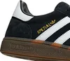 A close-up view of the side of a black Adidas sneaker. Podgląd zdjęcia produktu