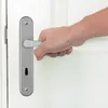 A hand is shown turning a door handle. Anteprima dell’immagine prodotto