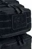 A close-up view of a black backpack, showing its texture and a patch with a logo. Náhled obrázku produktu