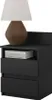 A black nightstand with a lamp and books on top. Náhled obrázku produktu