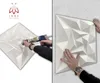 A split image showing how to install 3D wall panels. The left side shows a person applying adhesive to a panel with a caulk gun, and the right side shows a person pressing a panel onto a wall. Produktbild-Vorschau