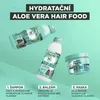 Three bottles and a jar of Garnier Fructis Aloe Vera Hair Food products are arranged diagonally against a light green background. Text overlays describe the products and their benefits. Podgląd zdjęcia produktu