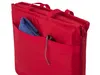 A red foldable mat bag with a blue towel and sunglasses in the pocket. Voir les images du produit