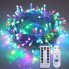 A bundle of colorful LED string lights with a remote control and USB connector. Produktbild-Vorschau