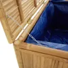 Close-up view of an open bamboo storage chest with a blue liner. Voir les images du produit