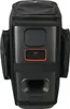 A black protective cover for a speaker, with the speaker partially visible inside. Voir les images du produit