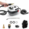 A handheld steam cleaner and its accessories are displayed against a white background. Náhled obrázku produktu