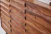 A close-up view of the textured wooden doors of a sideboard. Náhled obrázku produktu