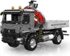 A studio shot of a toy construction truck with a crane. Produktbild-Vorschau