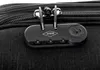 A close-up view of a black luggage combination lock attached to a black fabric suitcase. Produktbild-Vorschau