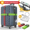 A suitcase with accessories, including straps, a luggage scale, and luggage tags. Produktbild-Vorschau