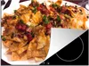 KitchenYeah© Herdabdeckplatte Eine Nahaufnahme von Nachos Produktbild-Vorschau 1
