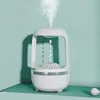 A white humidifier is shown emitting mist against a textured light green background. Náhled obrázku produktu