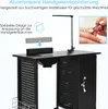 A black nail technician table with a lamp and a hand rest, with text overlays describing features. Voir les images du produit