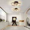A modern hallway with two ceiling lights, a console table with artwork and a bust, and built-in cabinets. Anteprima dell’immagine prodotto