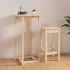 A wooden bar table and stool set against a light-colored wall. Náhled obrázku produktu