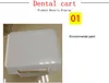 A close-up of a white dental cart with a gold handle, with text overlays indicating product details. Náhled obrázku produktu