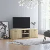 A living room scene with a TV stand, TV, artwork, and a chair. Náhled obrázku produktu