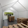 A forklift is moving pallets inside a white tent structure. Produktbild-Vorschau