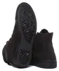 A pair of black Converse Chuck Taylor All-Star high-top sneakers shown from a rear-side angle, with one shoe upright and the other lying on its side to reveal the sole. Produktbild-Vorschau