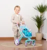 A young boy is playing with a Stitch-themed toy stroller indoors. Náhľad obrázku produktu