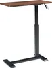 A standing desk with a wooden top and black metal base. Náhľad obrázku produktu