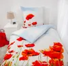 A bed with a duvet cover and pillow featuring a poppy flower print. Produktbild-Vorschau