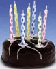 A close-up of a chocolate cake with colorful birthday candles. Anteprima dell’immagine prodotto