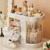 A makeup organizer filled with various cosmetic products, displayed on a surface with a blurred background. Náhled obrázku produktu