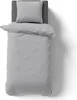 A top-down view of a gray duvet and pillow set on a bed. Produktbild-Vorschau
