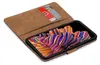 A brown book-style phone case with two cards inserted, showing a smartphone with a colorful abstract wallpaper. Náhľad obrázku produktu