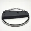 A black and chrome stand for a PlayStation 5 Slim console is shown against a white background. Anteprima dell’immagine prodotto