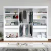 A white wardrobe with clothes and accessories neatly organized on shelves and hanging rods. Produktbild-Vorschau