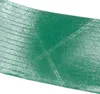 A close-up of a green material with a textured surface and embossed lines. Produktbild-Vorschau